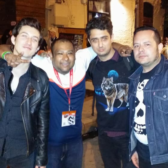 Mauricio Piña with people at industry and community events