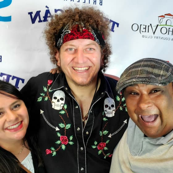 Mauricio Piña with people at industry and community events