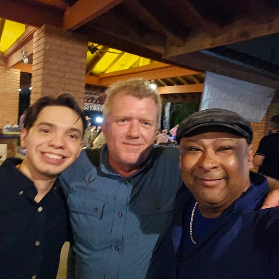 Mauricio Piña with people at industry and community events