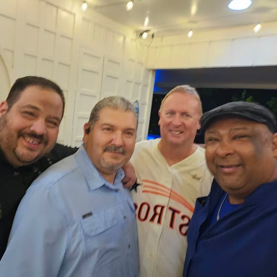 Mauricio Piña with people at industry and community events