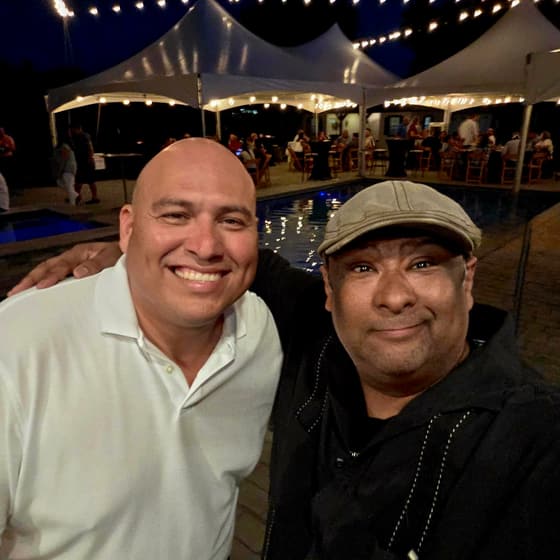 Mauricio Piña with people at industry and community events