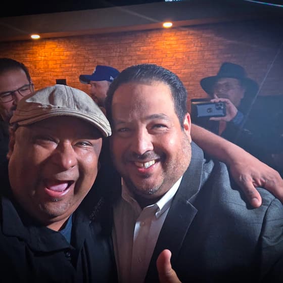 Mauricio Piña with people at industry and community events